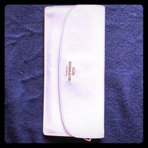 Cream Coach wallet. matching purse in closet